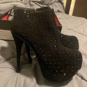 Wild pair Diamond studded stiletto black booties
